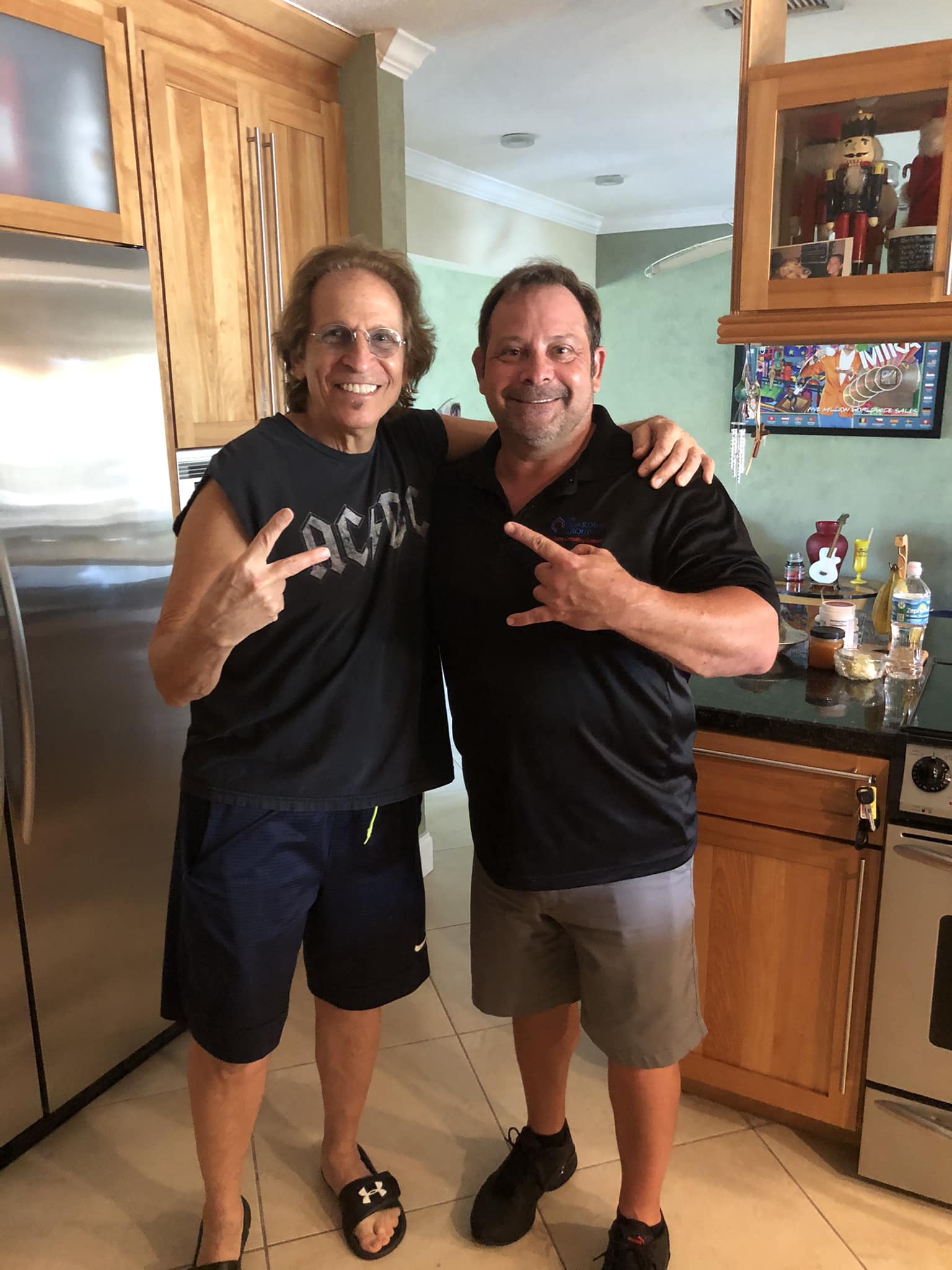 Public Adjuster Patrick Corona with his policyholder client Richie Supa of Aerosmith.